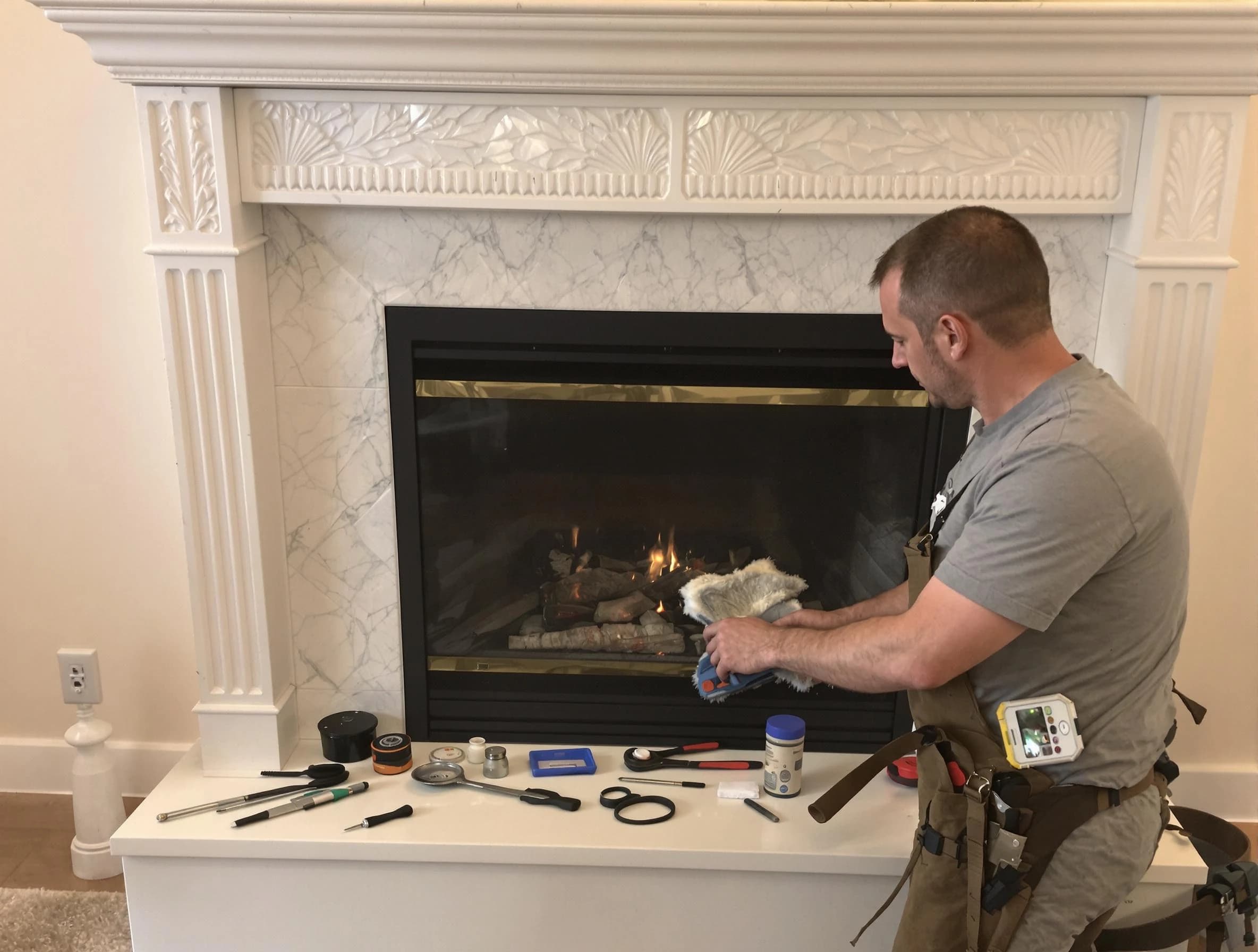 Genesee Chimney Sweep performing fireplace maintenance in Genesee, CO